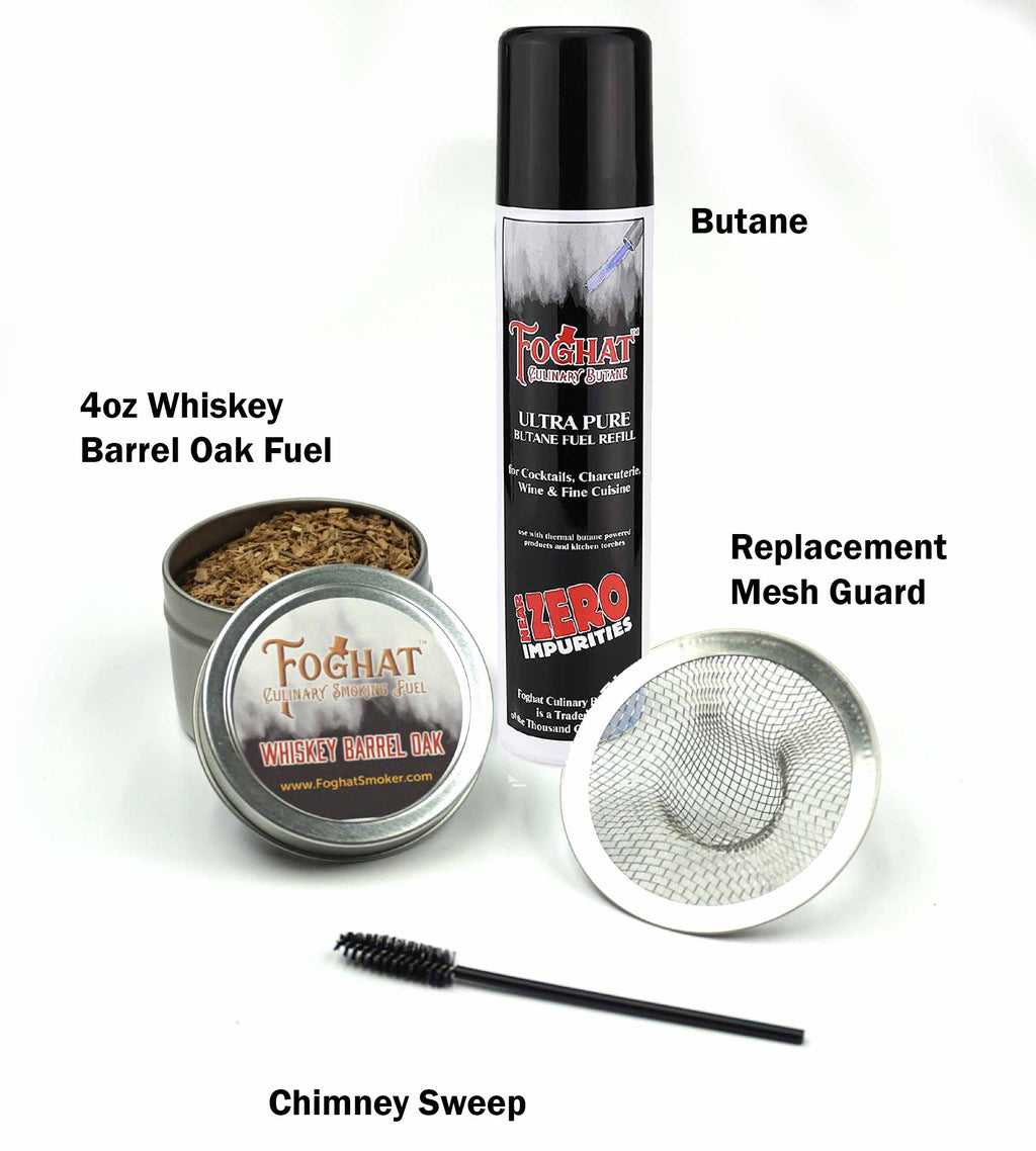 Foghat Cocktail Smoker Refill Kit — whiskey-barrel oak fuel, ultra-pure butane, replacement mesh guard, and chimney sweep brush, main product photo